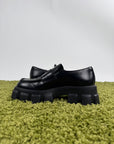 Mocassino Prada in pelle nera 9=43