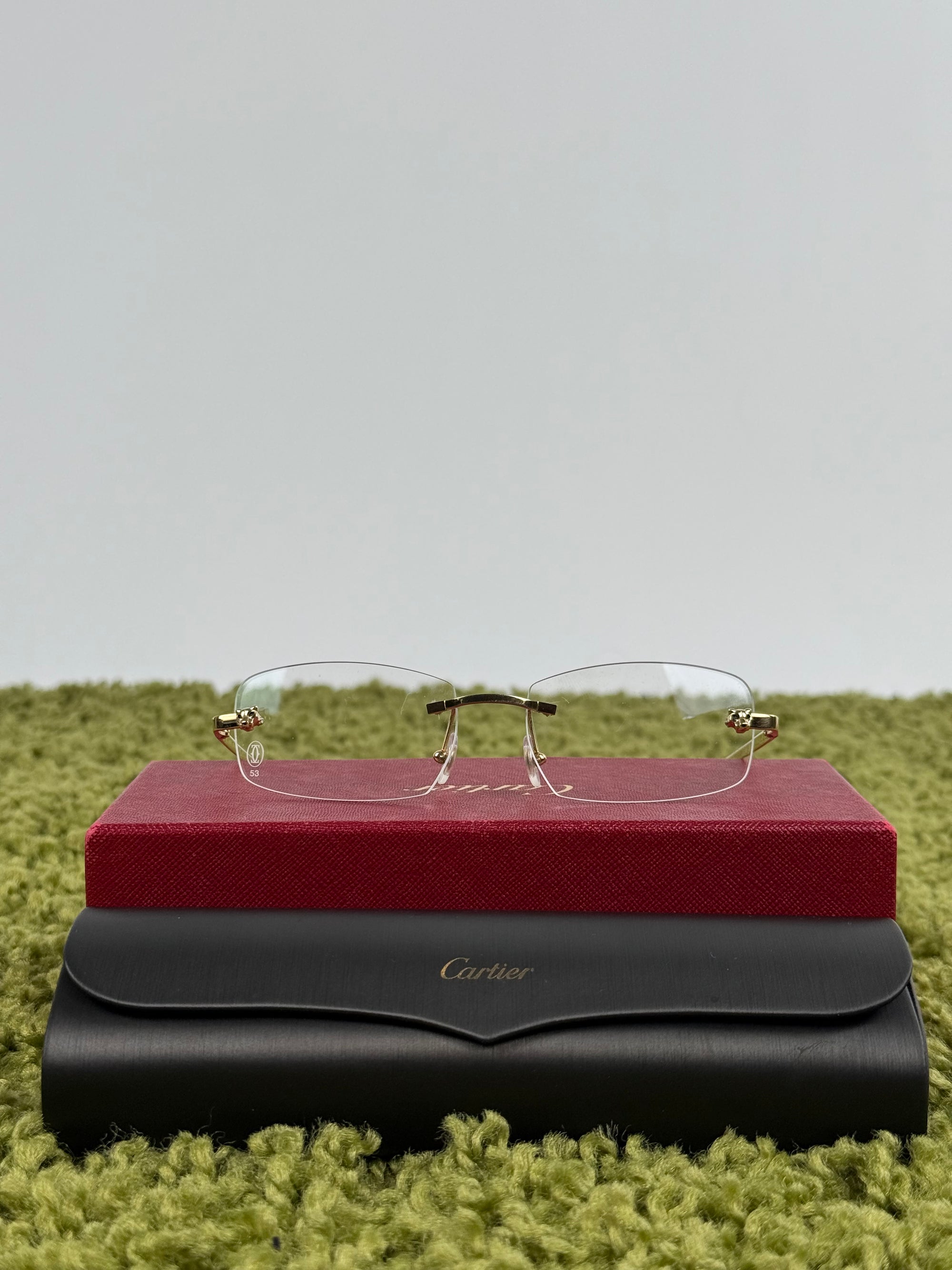 Occhiali Cartier con montatura dorata