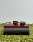 Occhiali Cartier CT0544S con motivo a borchie Clash Sulle aste oro