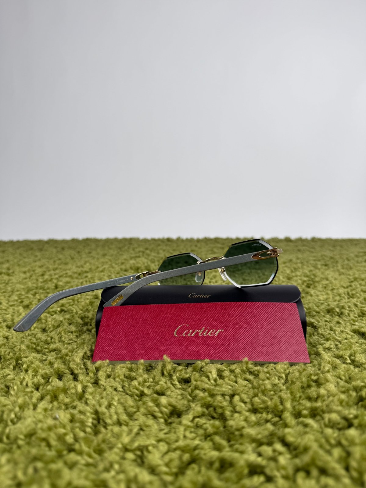 Occhiali da sole Cartier Decor C Allongè con montatura a giorno Verdi - Second Hand Di Fiore