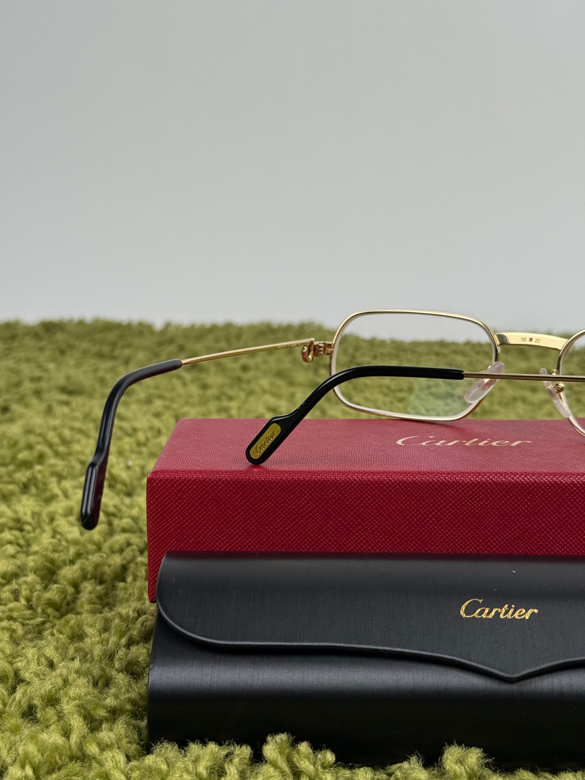 Occhiali Cartier Con aste oro e nere