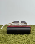Occhiali Cartier CT0058O con aste in acetato effetto avorio