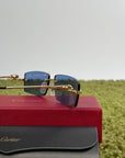 Occhiali da sole Cartier Pantère Oro con Lenti blu