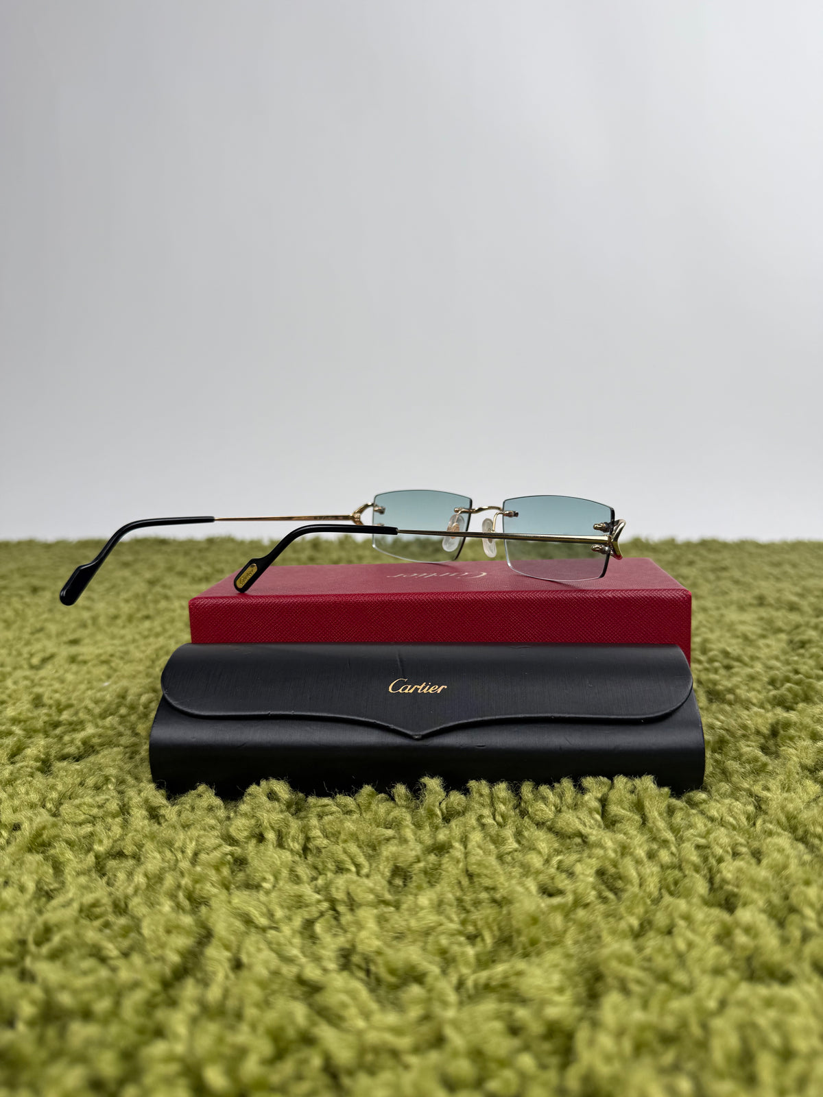 Occhiali da sole Cartier con aste oro