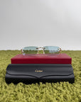 Occhiali da sole Cartier con aste oro