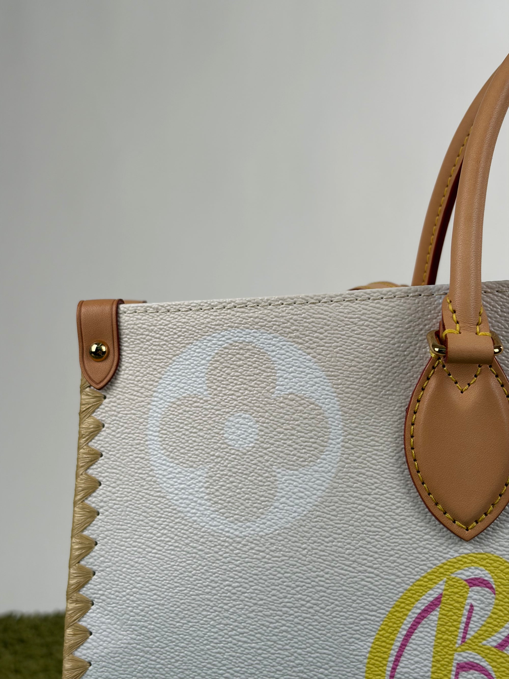 Borsa Louis Vuitton OnTheGo azzurra bianca e gialla