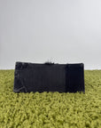 Borsa Balenciaga Hourglass Small in denim patchwork nero con logo B metallico argento