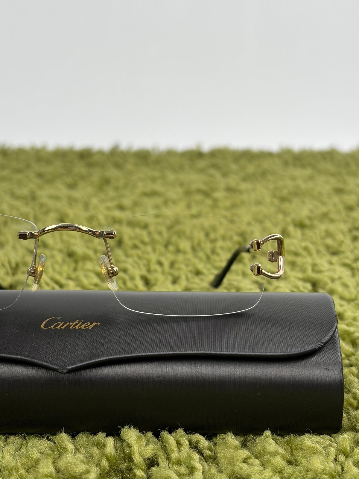 Occhiali da sole Cartier Eyewear Con montatura a giorno e aste Oro - Second Hand Di Fiore