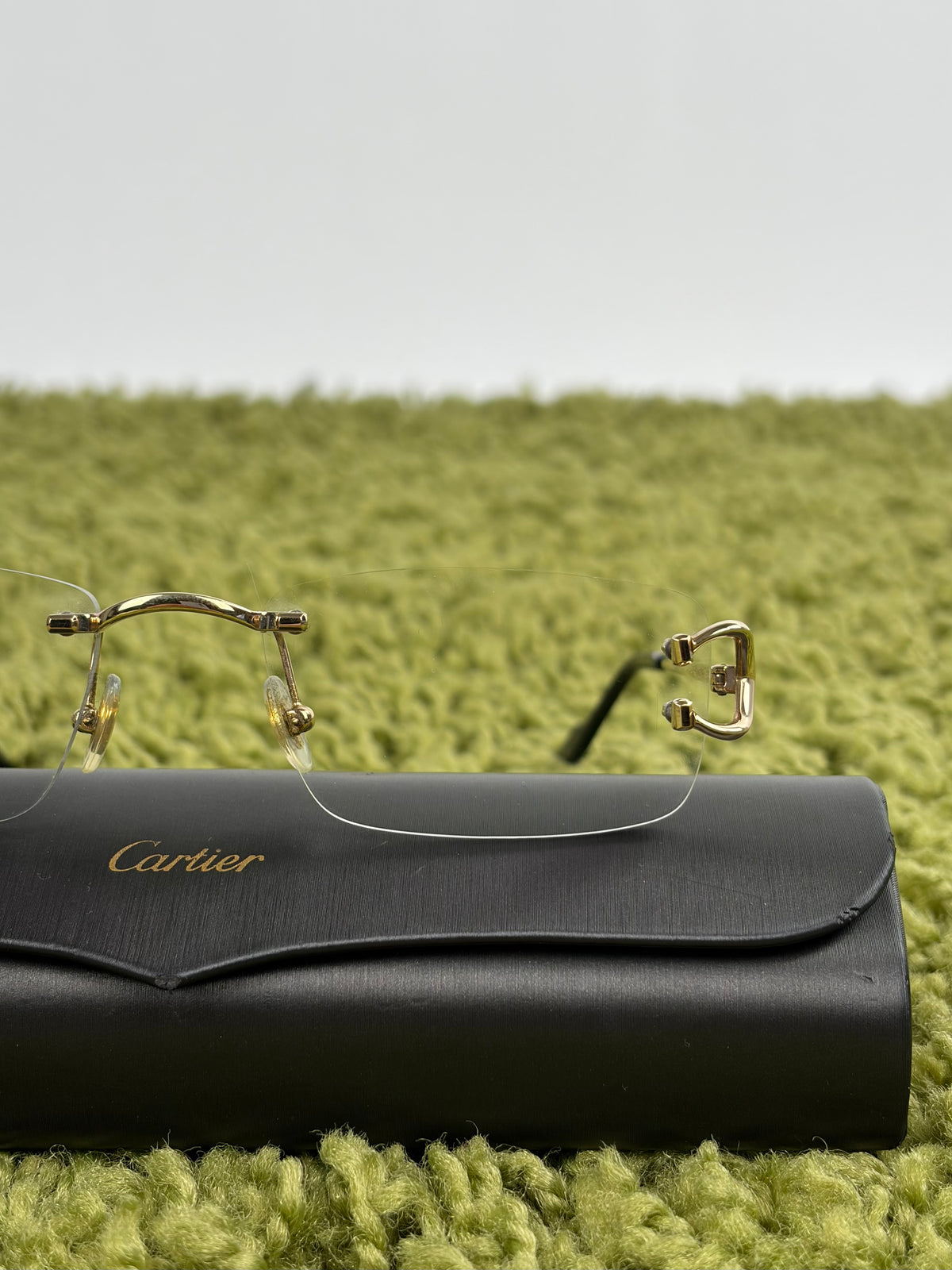 Occhiali da sole Cartier Eyewear Con montatura a giorno e aste Oro