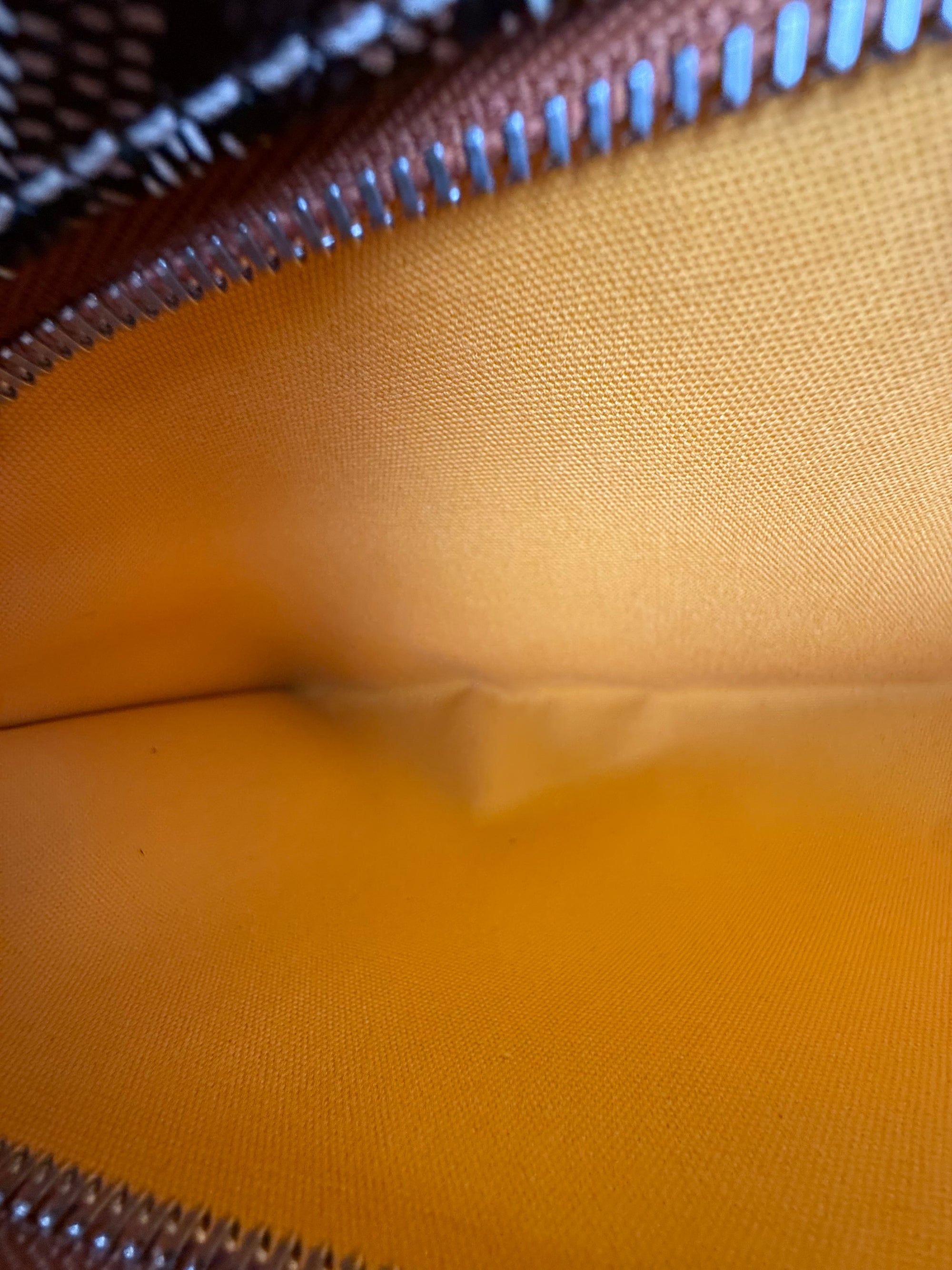 Pochette Goyard Jouvence in tela Goyardine nera con profili marroni