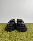 Louis Vuitton Mocassini Baroque in pelle nera 43 veste 44