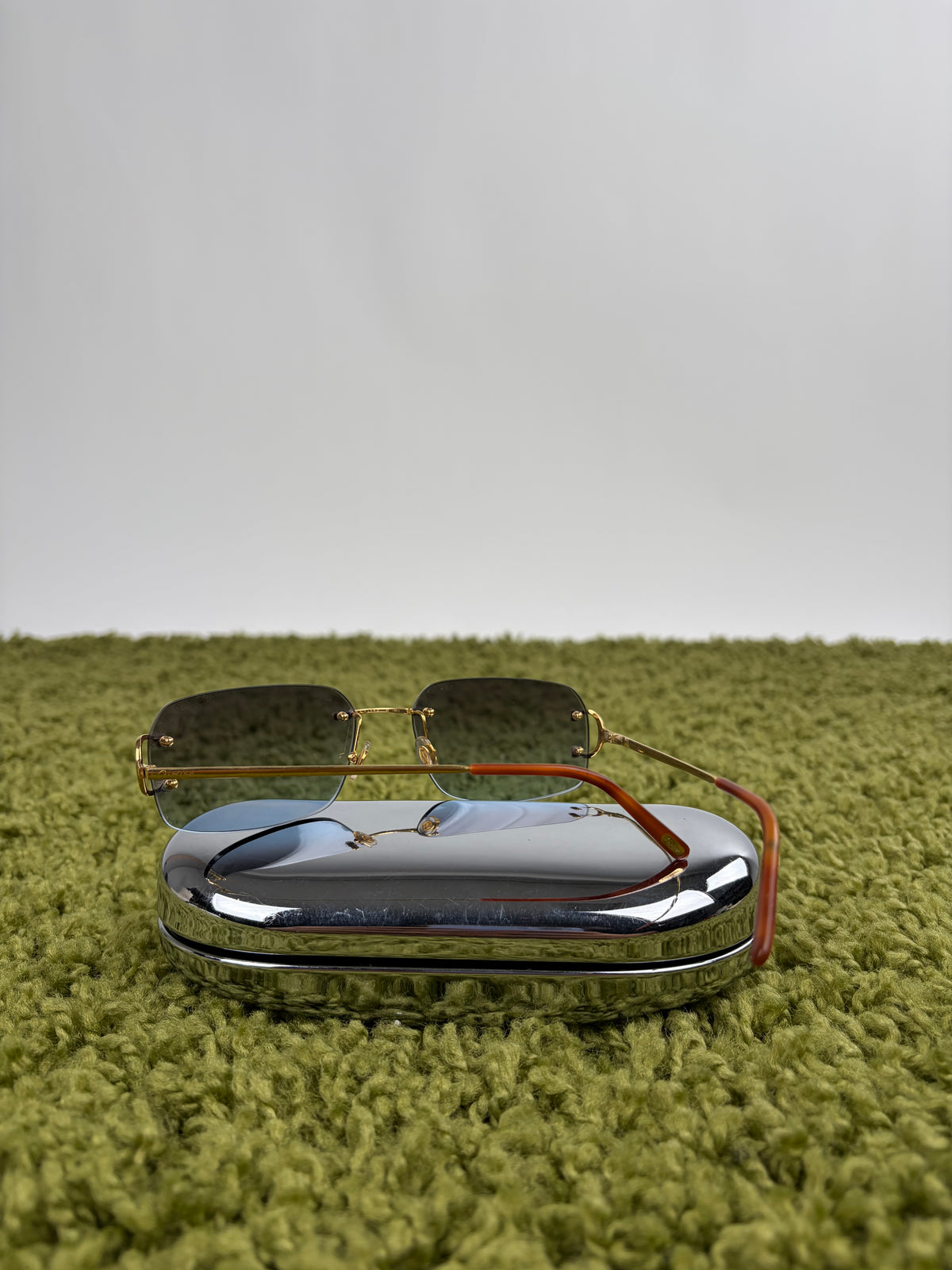 Occhiali da sole Rimless Cartier Eyewear Oro con lenti sfumate