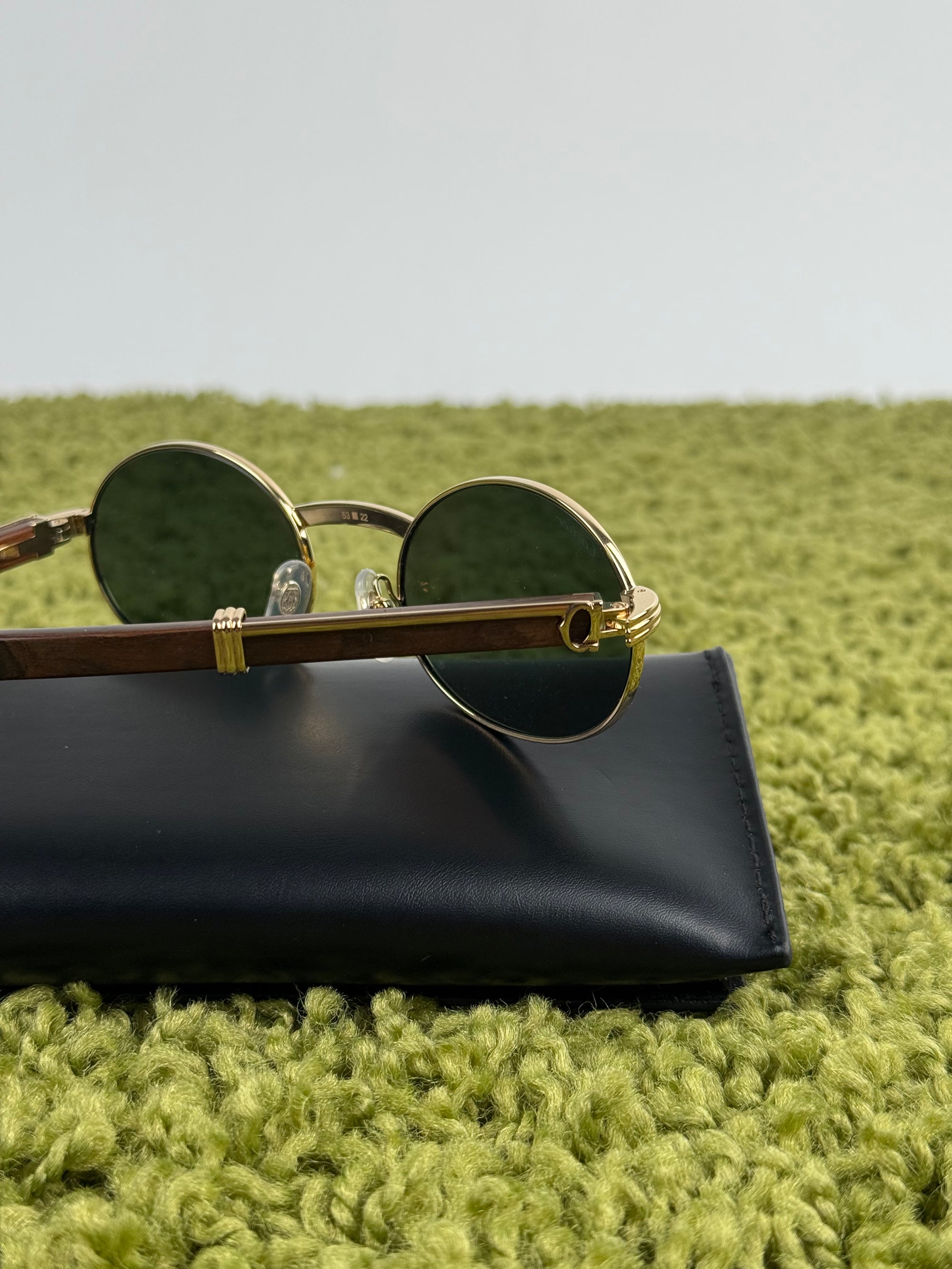 Occhiali cartier Tondi Con Aste In Legno