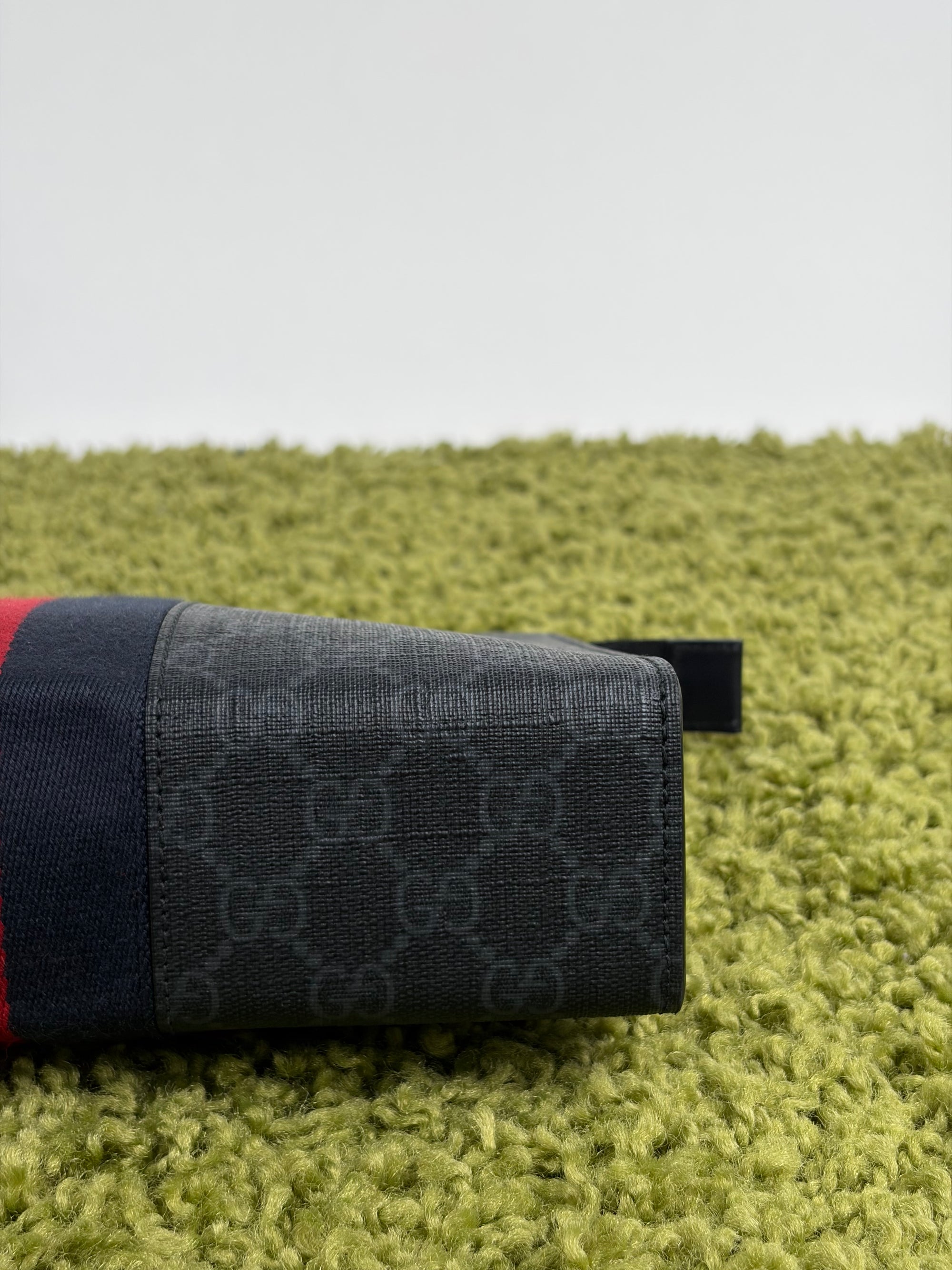 Pochette Gucci nera blu e rossa