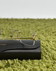 Occhiali da sole Cartier Eyewear Con montatura a giorno e aste Oro