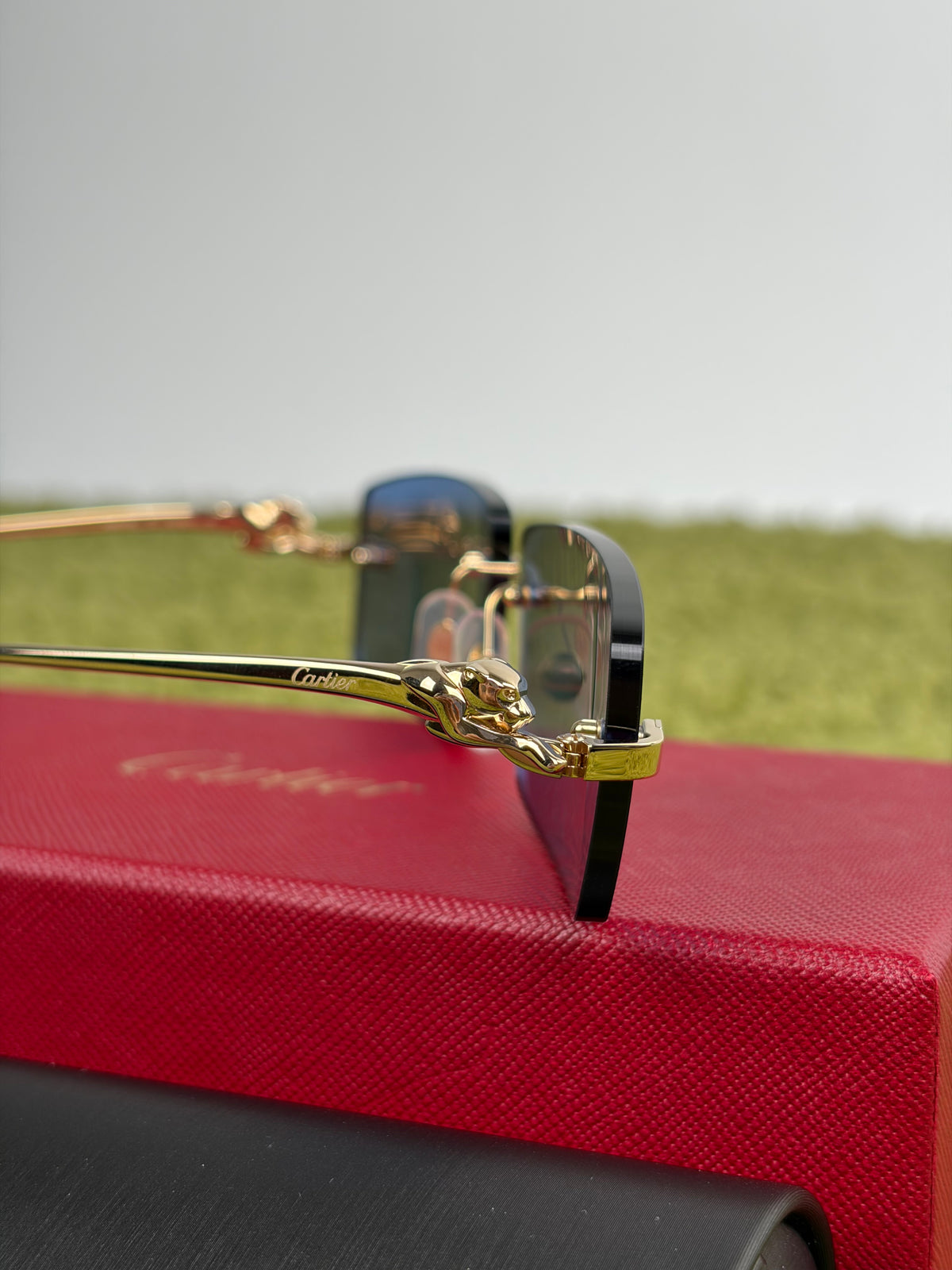Occhiali da sole Cartier Pantère Oro con Lenti blu