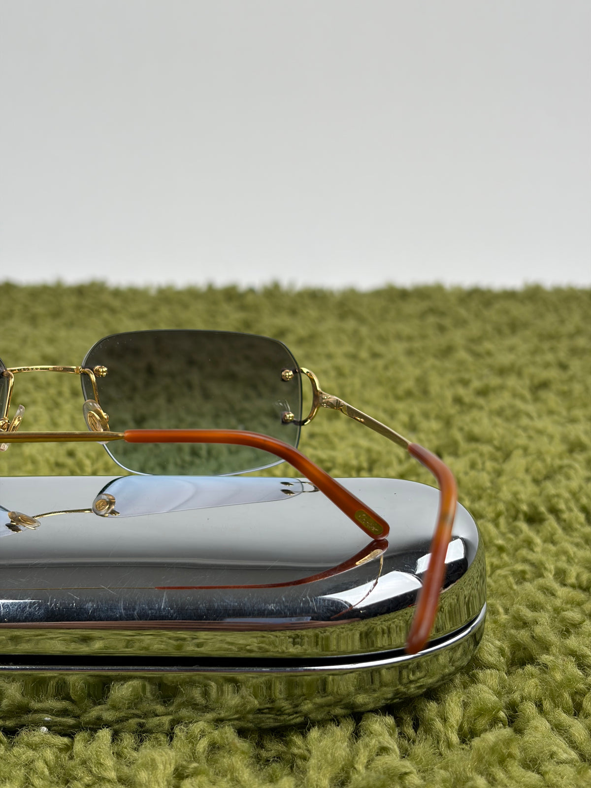 Occhiali da sole Rimless Cartier Eyewear Oro con lenti sfumate