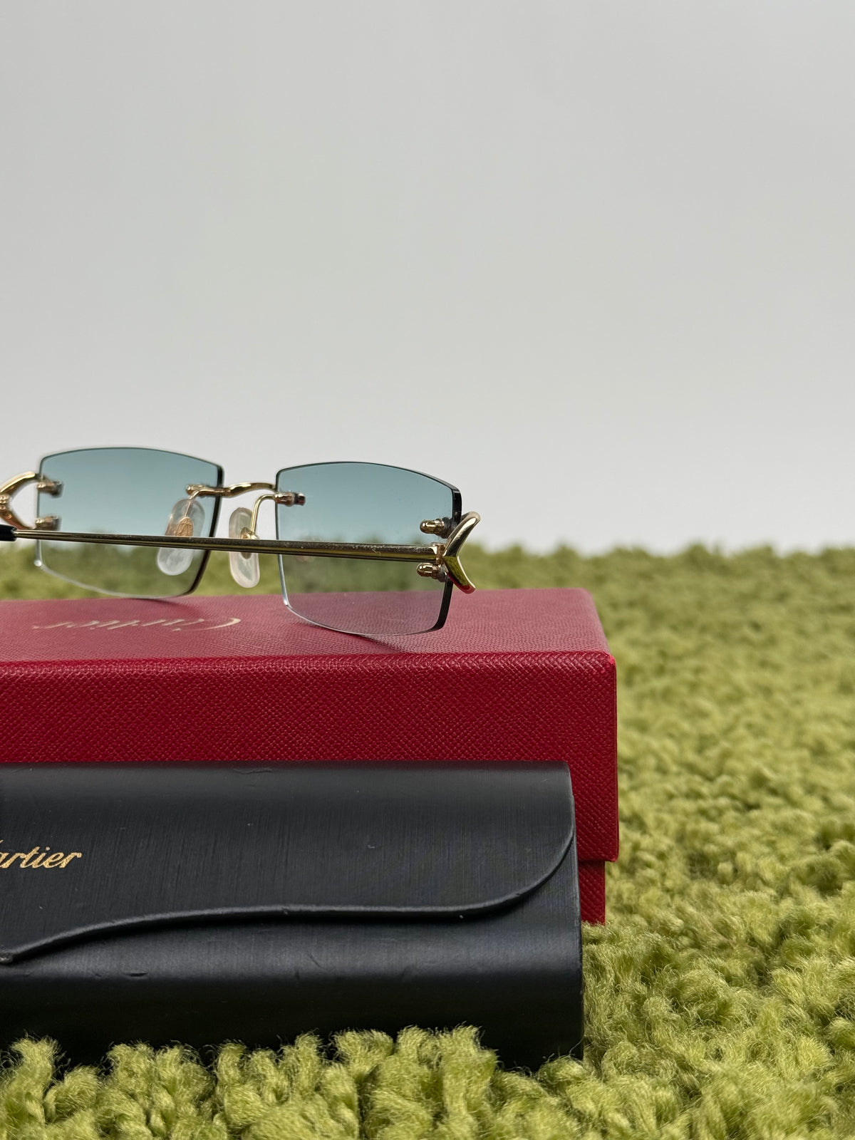 Occhiali da sole Cartier con aste oro