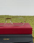 Occhiali Cartier Con aste oro e nere