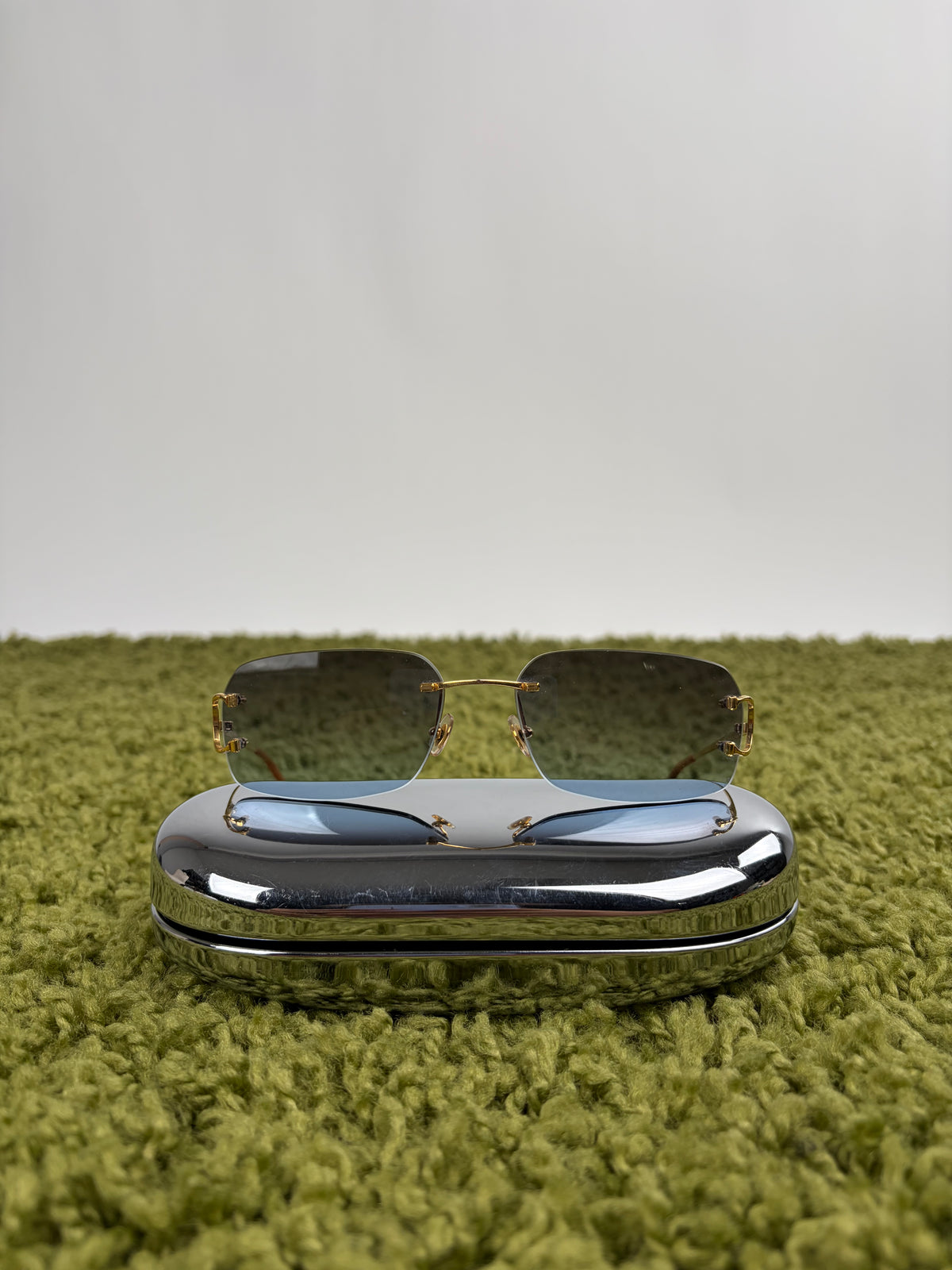 Occhiali da sole Rimless Cartier Eyewear Oro con lenti sfumate