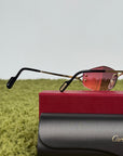 Occhiali da sole Geometrici Panthère de Cartier con lenti rosa e aste oro