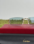 Occhiali da sole Cartier con aste oro