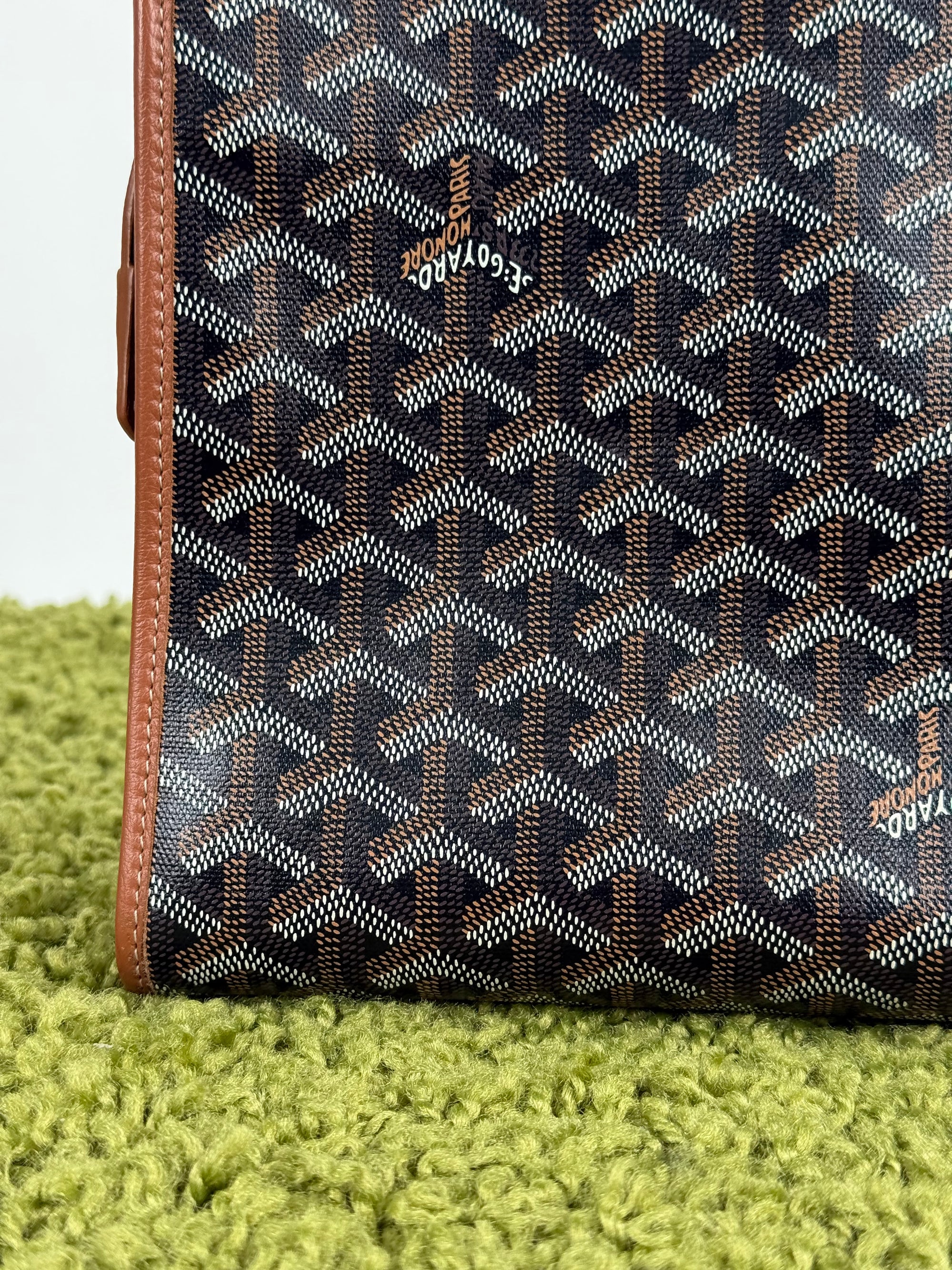 Pochette Goyard Jouvence in tela Goyardine nera con profili marroni