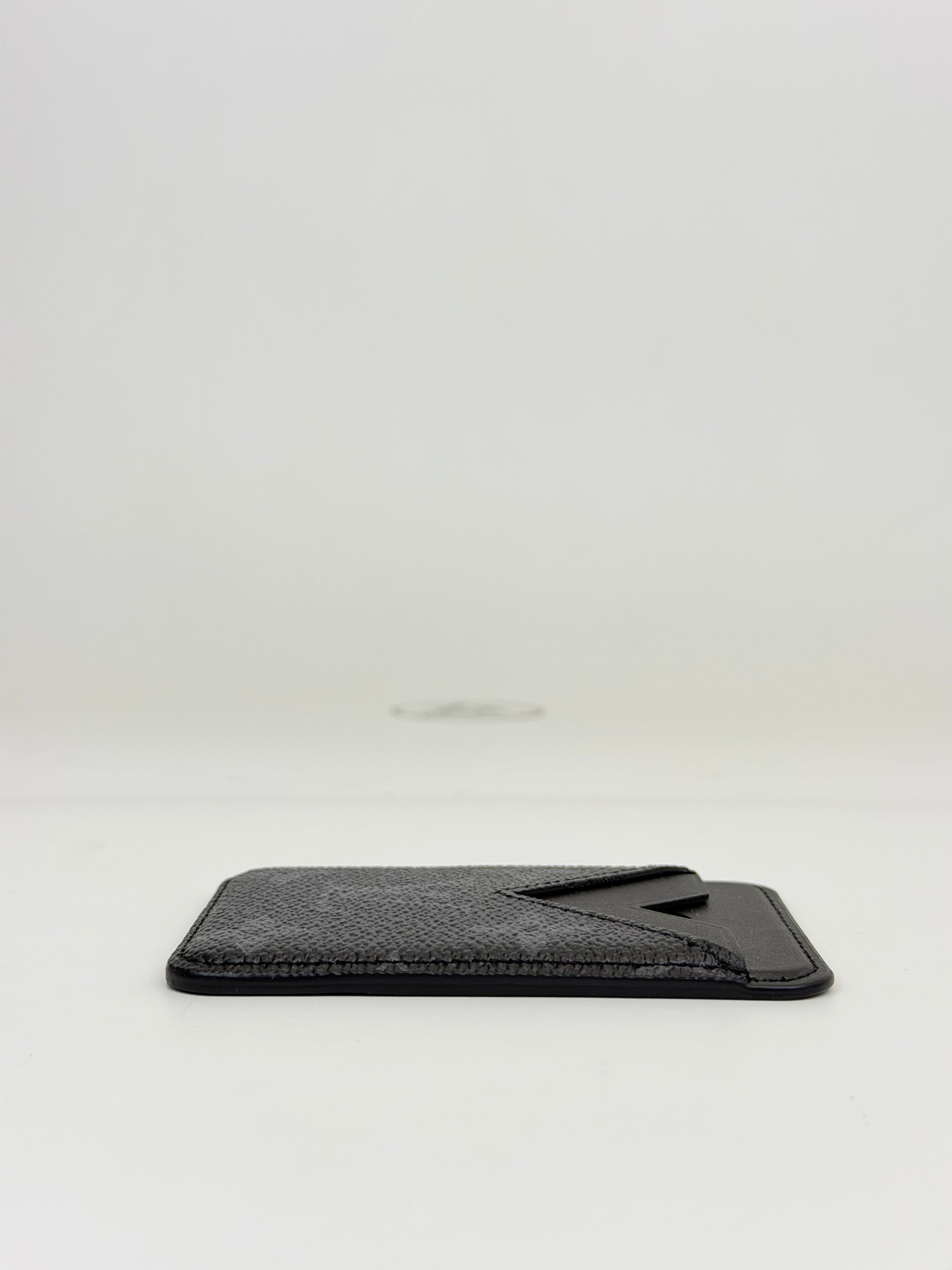 Portacarte magnetico Eclipse nero e grigio