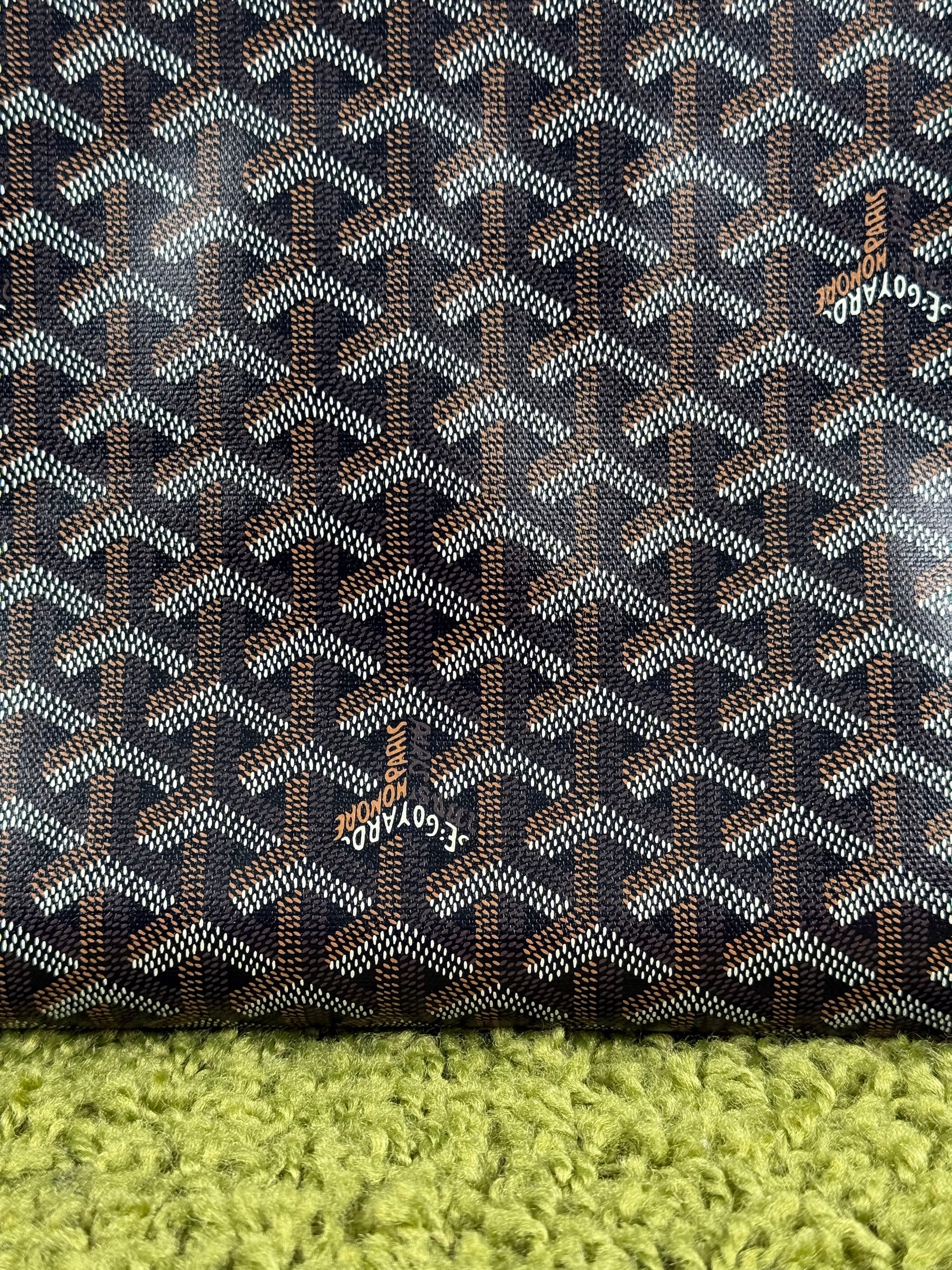 Pochette Goyard Jouvence in tela Goyardine nera con profili marroni