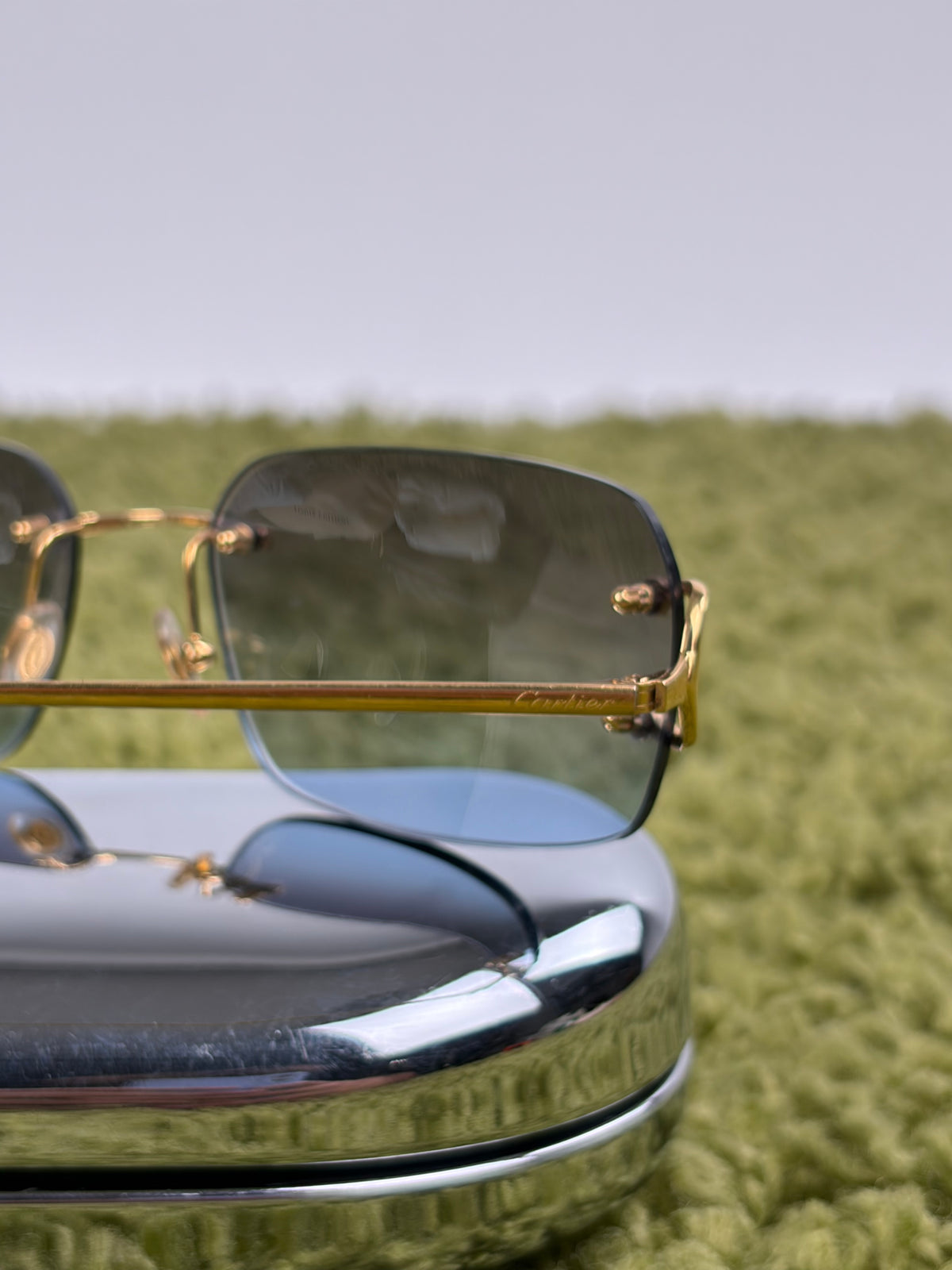 Occhiali da sole Rimless Cartier Eyewear Oro con lenti sfumate