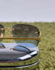 Occhiali da sole Rimless Cartier Eyewear Oro con lenti sfumate
