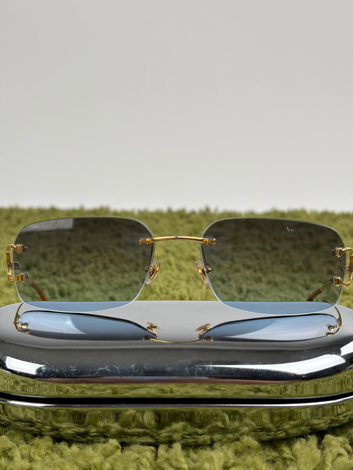 Occhiali da sole Rimless Cartier Eyewear Oro con lenti sfumate