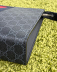 Pochette Gucci nera blu e rossa