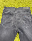 Jeans Amiri Nero con dettagli Verdi 34