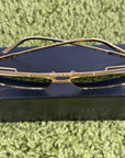 Occhiali da sole Louis Vuitton Rise Metal Oro