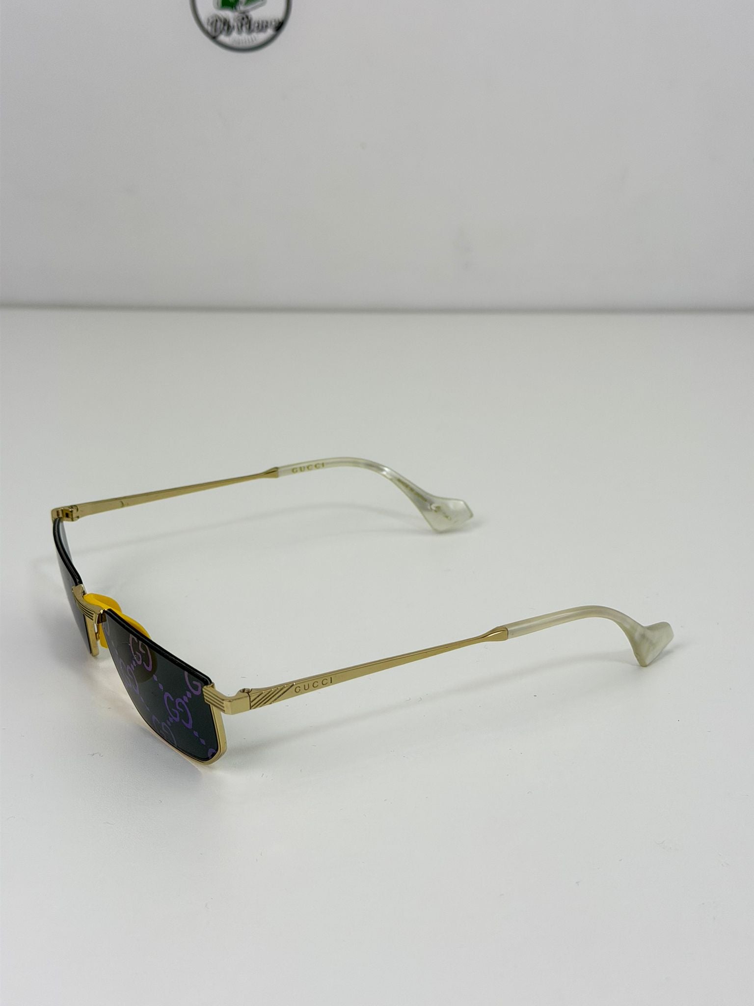 occhiali Gucci oro e multicolore