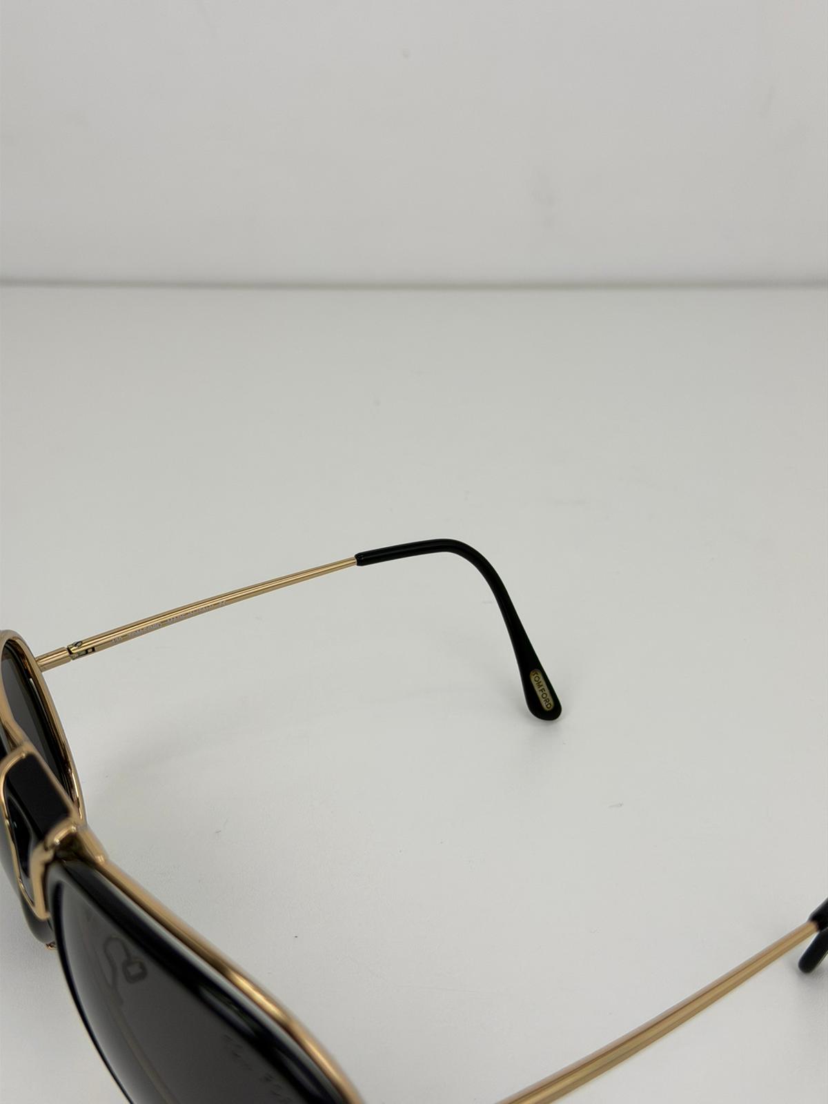 occhiali tom Ford neri e oro