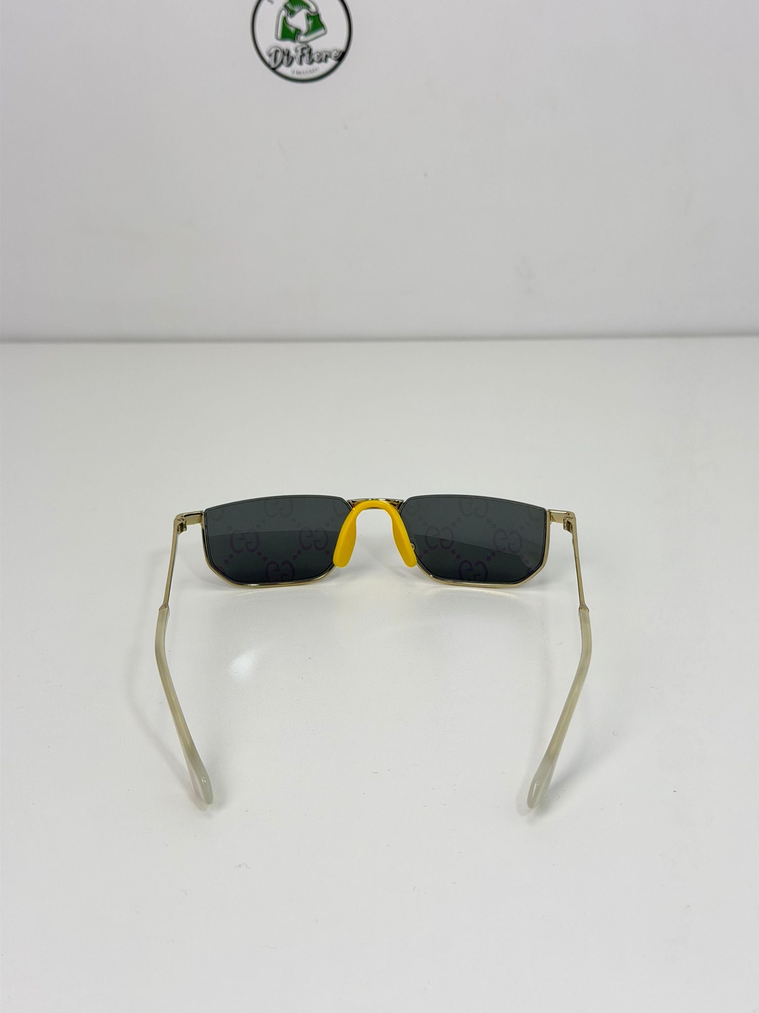 occhiali Gucci oro e multicolore