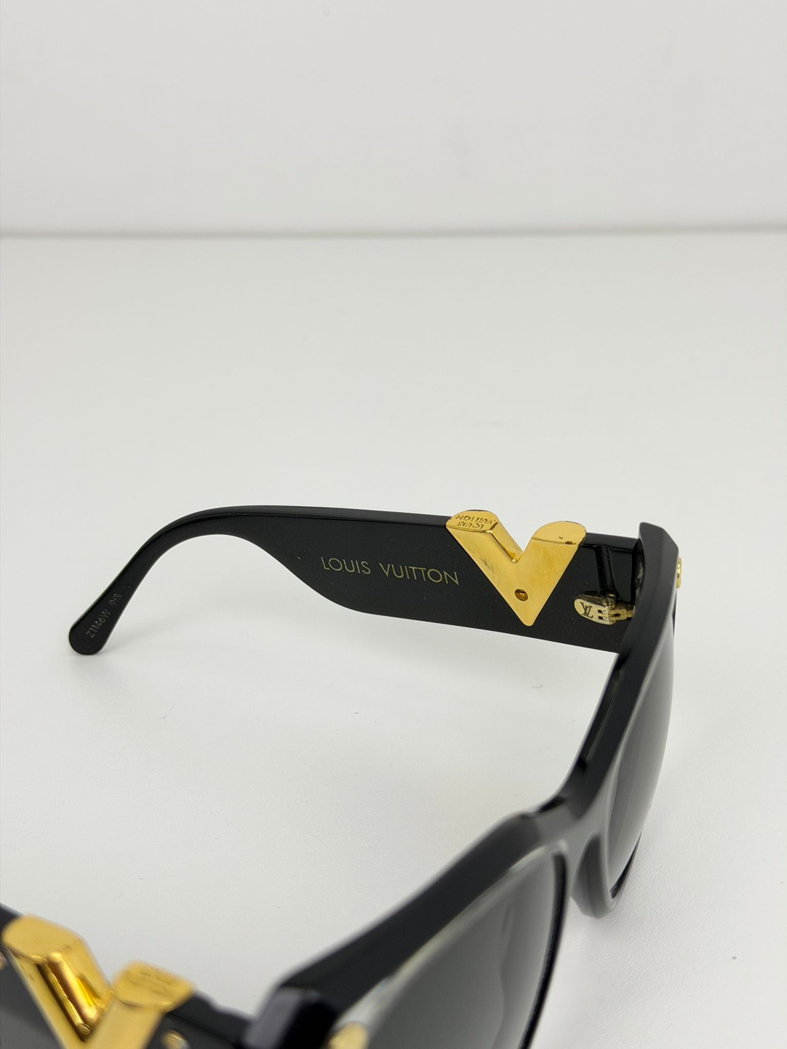 occhiali Louis Vuitton neri e oro