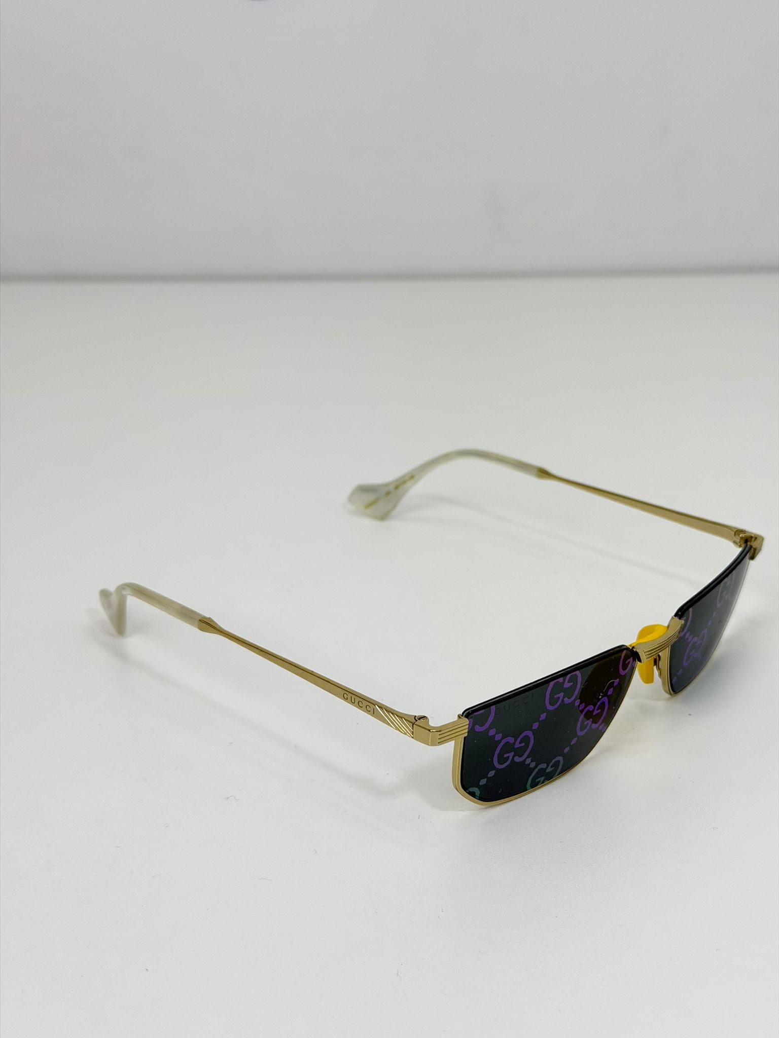 occhiali Gucci oro e multicolore